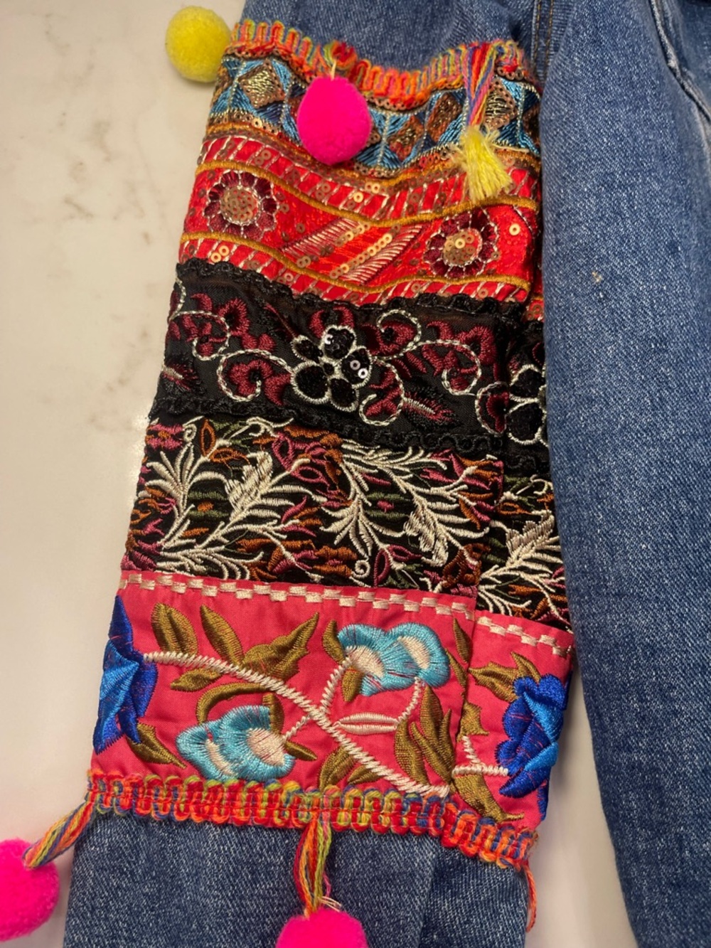Velzera Women’s Denim Jacket with Multicolor Embroidered Panels and Pom-Poms - Picture 6 of 16